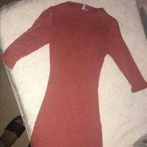 Pink dress. It is knee length.